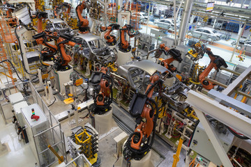 body of car on conveyor top view. Modern Assembly of cars at the plant. The automated build process of the car body