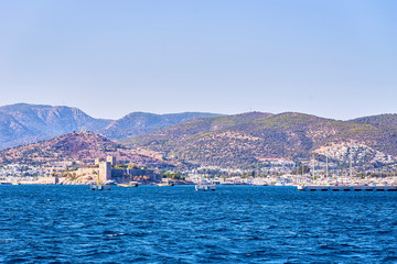 Fototapeta na wymiar Turquoise water near beach on Aegean coast sea Turkish resort, Bodrum, Turkey