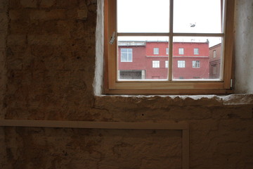 A view from a window of some loft at red industrial building