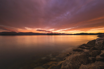 Amazing sunset light and colours by the shores of Gjerdavika, Norway.
