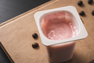 Dieting morning with a pink berry yogurt