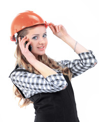 young woman engineer talking on mobile phone