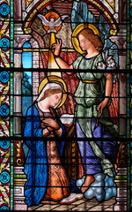 Annunciation to the Virgin Mary, stained glass window in the Cathedral of Saint Lawrence in Lugano,...