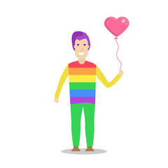 Young men wearing a rainbow t shirt and holding a heart shape balloon.