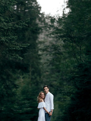 A cute pair of white shirts hugs