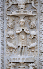 Relief on the portal of the Cathedral of Saint Lawrence in Lugano, Switzerland