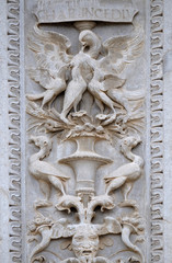 Relief on the portal of the Cathedral of Saint Lawrence in Lugano, Switzerland