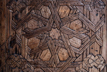 Details of a carved wood wall art geometrically handmade