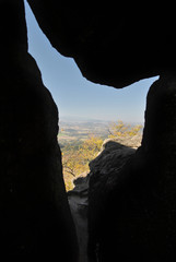 Isthmus in a rock formation with a view of the autumn valley