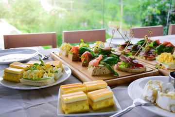 mix food on dinner table, appetizer and dessert.