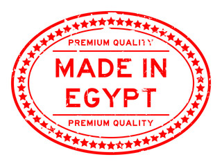 Grunge red premiumq quality made in Egypt oval rubber seal business stamp on white background