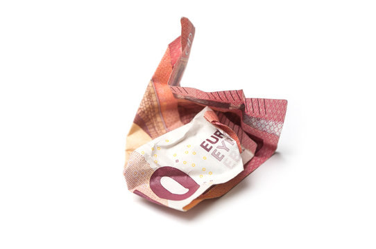 Closeup Of Crumpled  Ten Euros Banknote On White Background