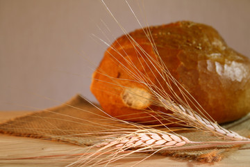 not a cunning still life. bread, milk, ears of wheat