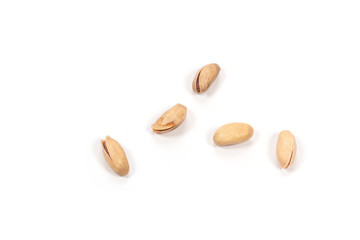 Obraz premium Pistachio nuts on white background