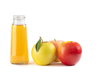 apples and a bottle of apple juice isolated on white background