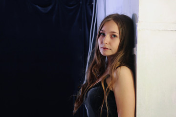 portrait beauty girl in dress with dark background