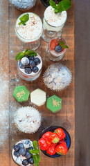 desserts, berries, muffins, sweets on the table