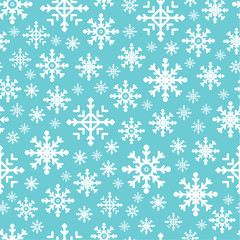 Seamless pattern with snowflakes and blue background