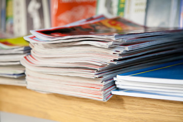  a stack of newspapers library