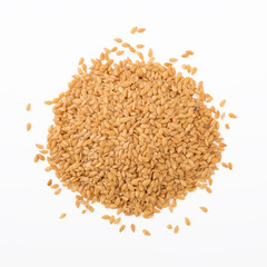 Golden flaxseed isolated on white background, top view