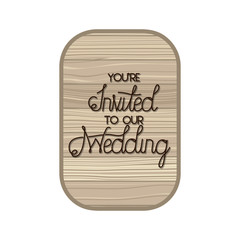 wedding invitation in frame of wooden