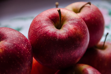 red apples on black background