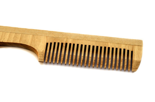 wooden comb isolated on white background