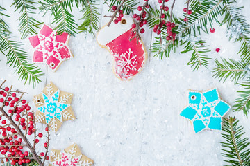 Christmas card, splash screen. Christmas tree and gingerbread on a light background. New year celebration and christmas concept
