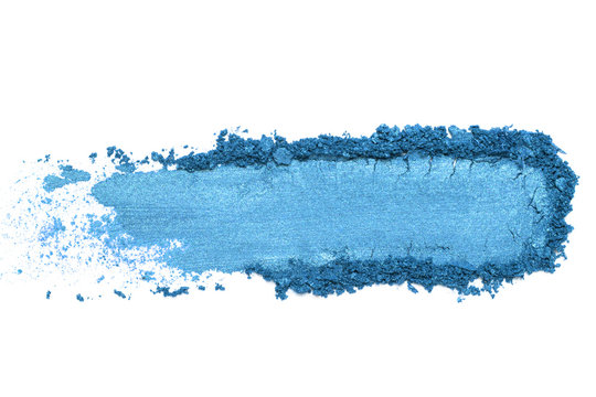Blue crumbled / crushed eyeshadow isolated on white