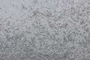background. ice pattern on frozen glass