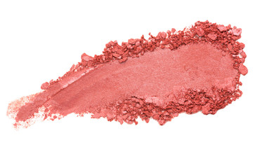 Crumbled / crushed red eyeshadow powder isolated on white background. Cosmetic photography