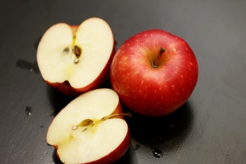 red apples on black background