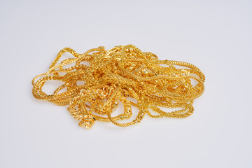 Gold jewelry on white background
