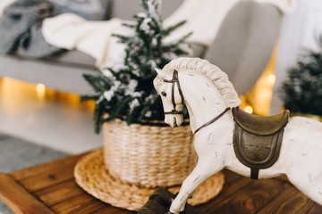 Cozy home interior objects. Christmas mood. Small Christmas tree.