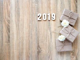 Happy new year 2019 decorative with gift box on wooden