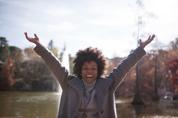 Afro woman having fun in the park
