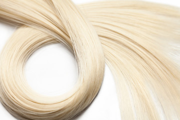 Closeup on luxurious glossy blonde hair