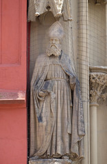 Fototapeta premium Statue of Saint on the portal of the Marienkapelle in Wurzburg, Bavaria, Germany
