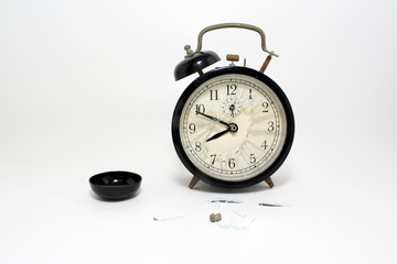 old alarm clock isolated on white background