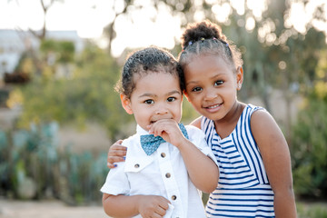 Portrait of siblings in park