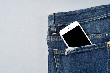 A Smartphone In The Pocket Of Jeans                               