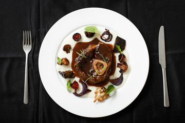 Top view of meat dish with grilled vegetables