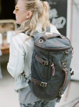 traveler with duffle bag backpack