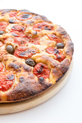 Focaccia typical of Bari Italy with tomatoes and olive