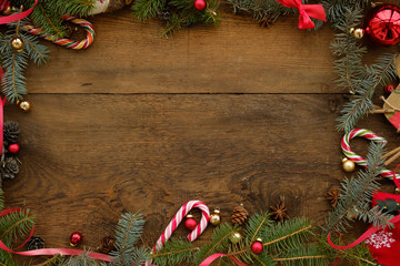 Christmas wooden background with snow fir tree. View with copy space.