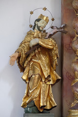 Obraz premium Saint John Nepomuk statue on the Holy Family altar in Maria im Grunen Tal pilgrimage church in Retzbach in the Bavarian district of Main-Spessart, Germany