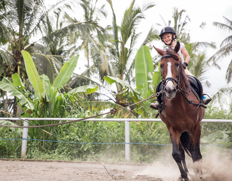 Little girl on her horse
