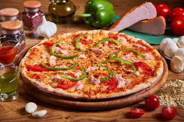 Delicious italian pizza served on wooden table
