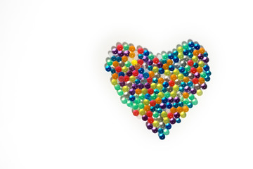Heart of beads on a white background.