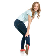 Fototapeta premium Beautiful woman goes walking showing of positive emotions happy on a white background. Isolation